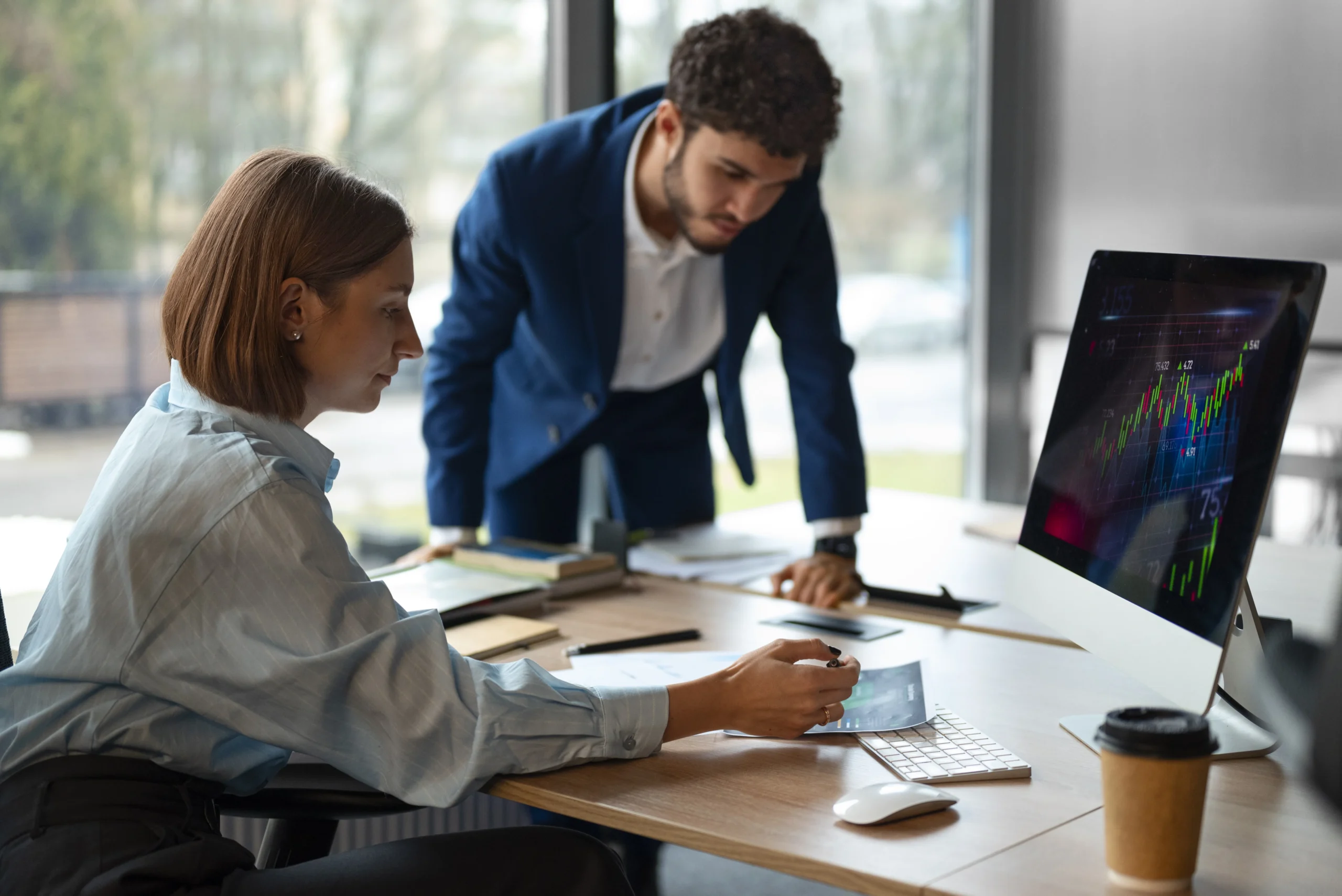 people-office-analyzing-checking-finance-graphs-scaled